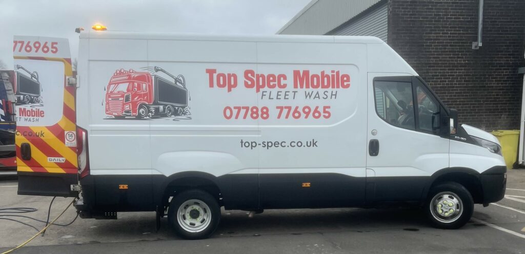 Top spec van with logo side view